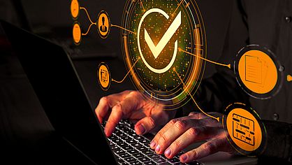 Hands typing on a keyboard with a digital checkmark interface overlay