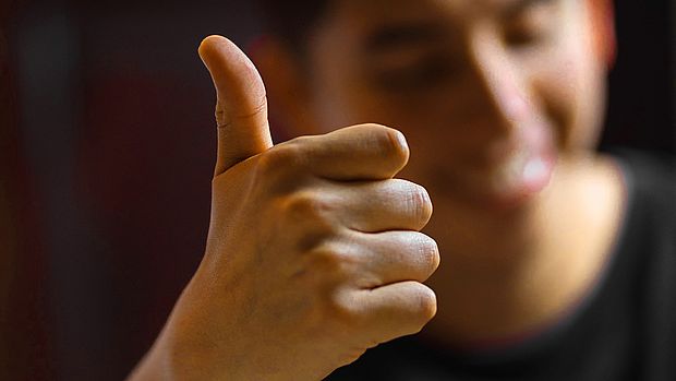 Thumbs up gesture