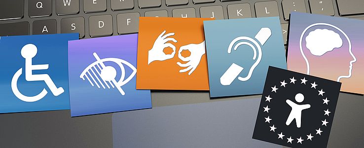 Header Accessibility EAA Icons representing different types of disabilities—including physical, visual, auditory, cognitive, and general accessibility—displayed over a computer keyboard.